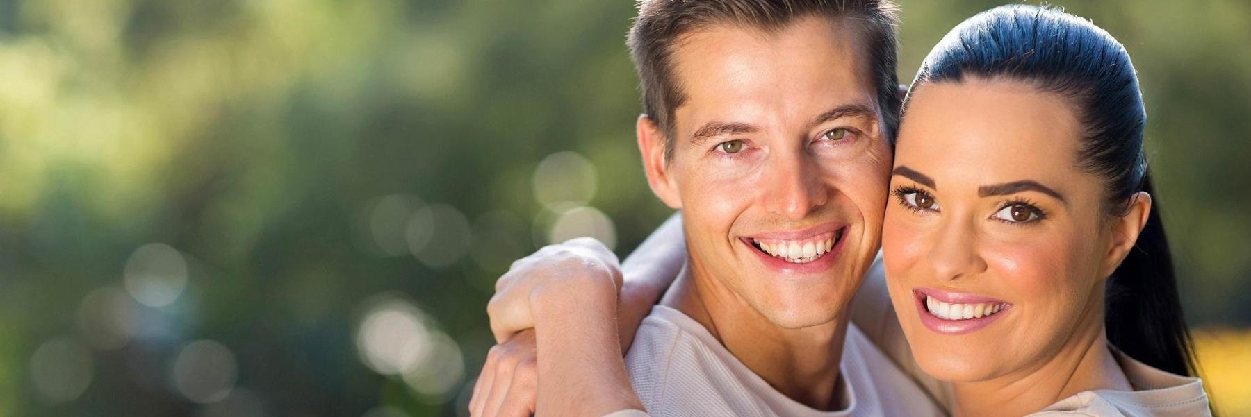 Couple smiling with veneers in Fairfield