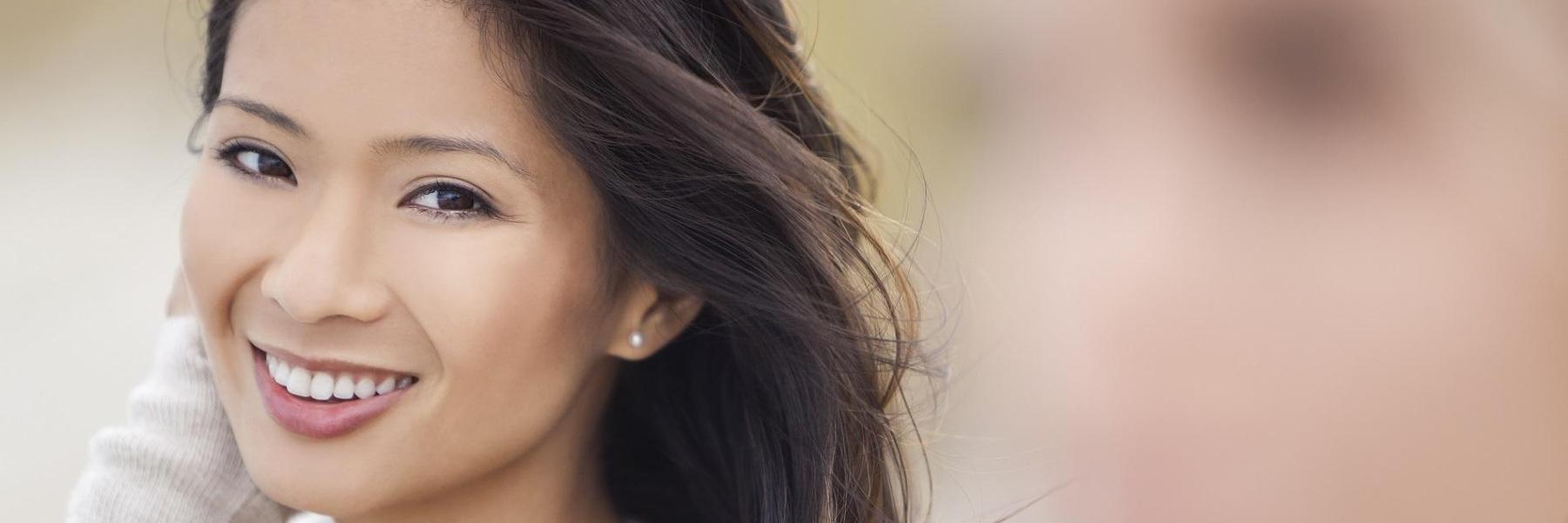 woman with dental implant in fairfield