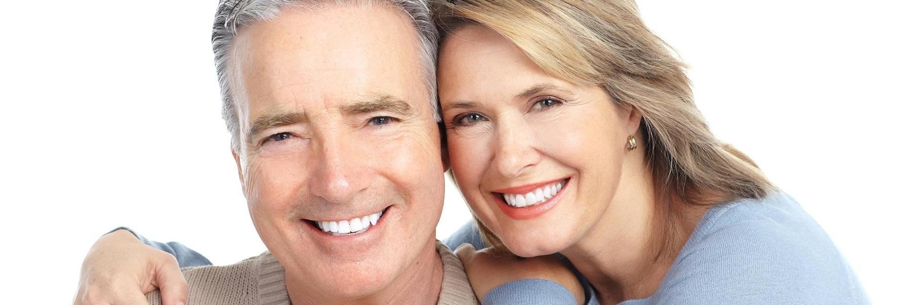 man and woman smiling